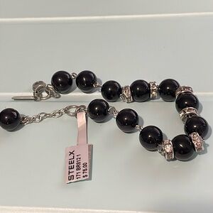 New with tag black stone with sparkle inserts, Steelx brand bracelet